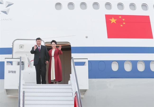 Chinese President Xi Jinping and his wife, Peng Liyuan, disembark from the plane in Madrid, Spain, Nov. 27, 2018. Xi Jinping arrived in Spain on Tuesday for a three-day state visit. [Photo: Xinhua/Xie Huanchi]