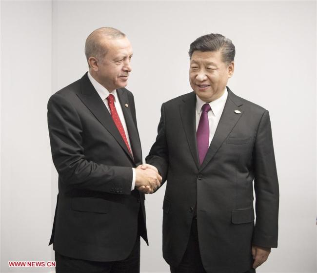 Chinese President Xi Jinping (R) meets with his Turkish counterpart Recep Tayyip Erdogan in Buenos Aires, Argentina, Nov. 30, 2018. [Photo: Xinhua]