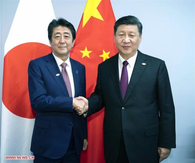 Chinese President Xi Jinping (R) meets with Japanese Prime Minister Shinzo Abe in Buenos Aires, Argentina, Nov. 30, 2018. [Photo: Xinhua]