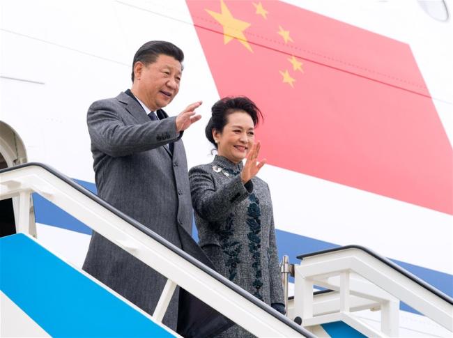 Chinese President Xi Jinping (L) and his wife Peng Liyuan disembark from the airplane after arriving in Lisbon, Portugal, on Dec. 4, 2018. Xi arrived in Portugal on Tuesday for a two-day state visit. [Photo: Xinhua/Li Xueren]