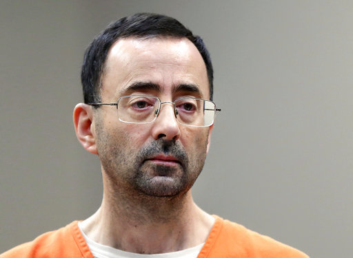 In this Nov. 22, 2017, file photo, Larry Nassar, a sports doctor accused of molesting girls while working for USA Gymnastics and Michigan State University appears in court in Lansing, Mich., where he pleaded guilty to multiple charges of sexual assault. [File photo:AP]
