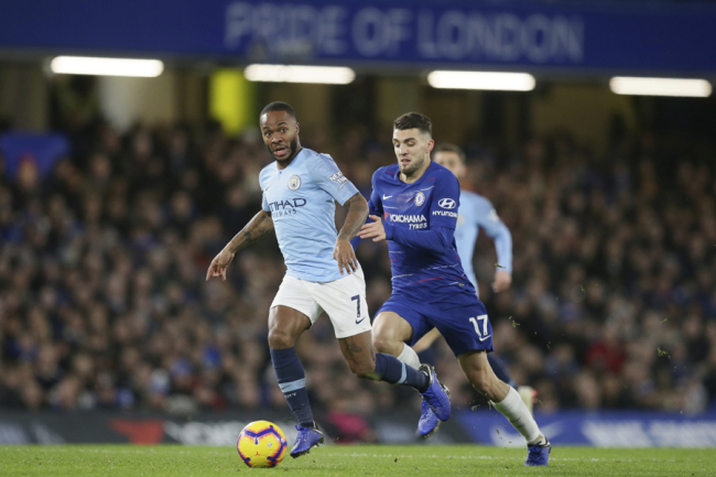 Manchester City's Raheem Sterling, left, runs with the ball following by Chelsea's Mateo Kovacic during the English Premier League soccer match between Chelsea and Manchester City at Stamford Bridge in London, Saturday Dec. 8, 2018. [Photo: AP]