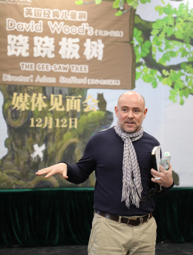 Children's play director Adam Stafford is in Beijing on Dec. 12, for a briefing with the media on how he and his Chinese colleagues have adapted his play "The See-saw Tree" for young Chinese audiences.[Photo:China Plus]
