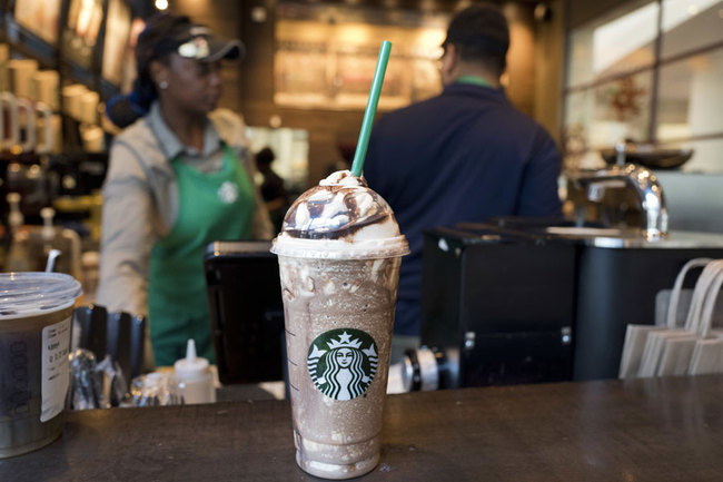  In this June 20, 2018, file photo a Venti Mocha Frappuccino is displayed at a Starbucks. Starbucks serves up its fiscal fourth-quarter results Thursday, Nov. 1. [Photo: AP/Mark Lennihan]