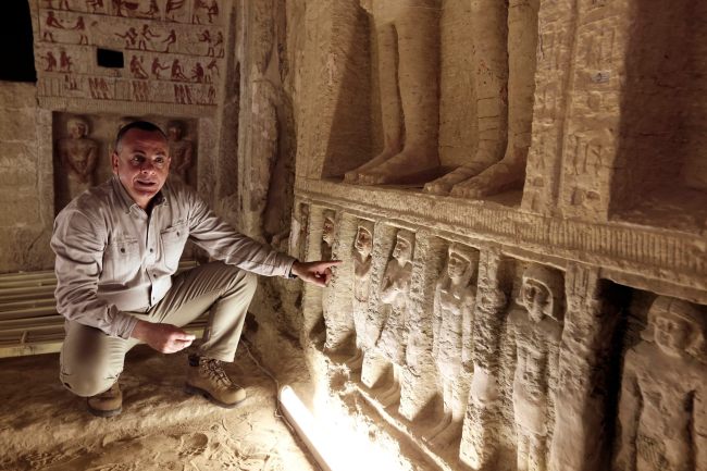 Mostafa Waziri, secretary general of the Supreme Council of Antiquities, speaks inside a recently uncovered tomb of the Priest royal Purification during the reign of King Nefer Ir-Ka-Re, named "Wahtye.", at the site of the step pyramid of Saqqara, in Giza, Egypt, Saturday, Dec. 15, 2018. [Photo: AP/Amr Nabil]