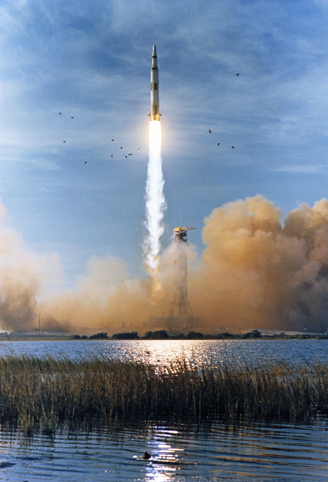 In this Dec. 21, 1968 photo made available by NASA, the Saturn V rocket carrying the Apollo 8 crew launches from the Kennedy Space Center in Florida with 7.5 million pounds of thrust. The vehicle has just cleared the tower at Launch Complex 39A [File photo: NASA via AP]