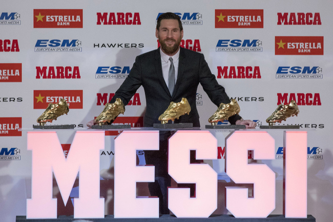 FC Barcelona's Lionel Messi from Argentina poses for the media after receiving his 5th Golden Boot award, in Barcelona, Spain, Tuesday, Dec.18, 2018. [Photo: AP]