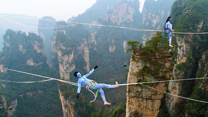 Walking a Tightrope Between Mountains 