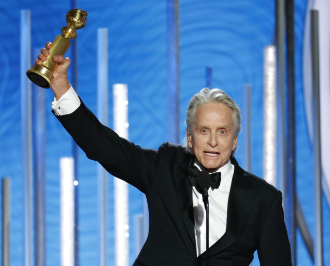 This image released by NBC shows Michael Douglas, winner of best actor in a TV series, musical or comedy for his role in "The Kominsky Method" at the 76th Annual Golden Globe Awards at the Beverly Hilton Hotel, Sunday, Jan. 6, 2019 in Beverly Hills, Calif. [Photo: NBC via AP/Paul Drinkwater]