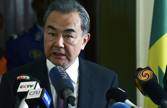 Chinese State Councilor and Foreign Minister Wang Yi looks on as he addresses media representatives during a press conference alongside his Senegalese counterpart at The Foreign Ministry in Dakar on January 6, 2019. [Photo: Seyllou/AFP]