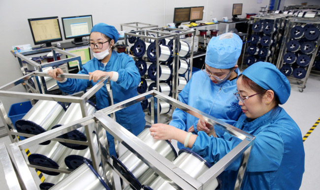 Staff work in a factory in Nantong, Jiangsu Province, November 27, 2018. [Photo: IC]