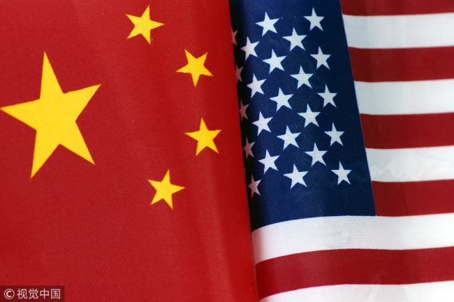 National flags of China and the U.S. [Photo: VCG]
