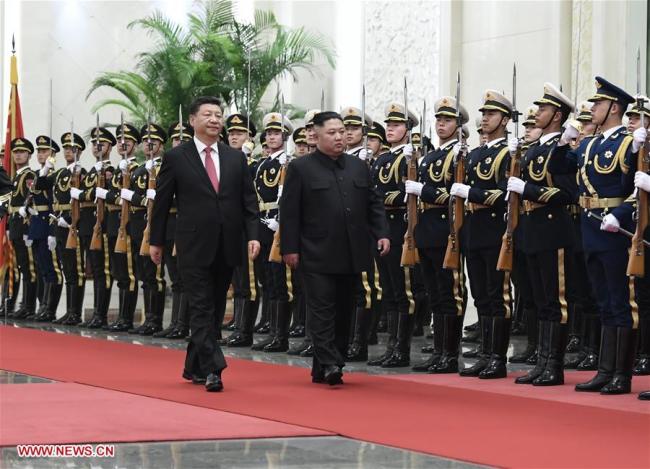 Xi Jinping, general secretary of the Central Committee of the Communist Party of China and Chinese president, holds a welcoming ceremony for Kim Jong Un, chairman of the Workers' Party of Korea and chairman of the State Affairs Commission of the Democratic People's Republic of Korea, before their talks at the Great Hall of the People in Beijing, capital of China, Jan. 8, 2019. Xi Jinping on Tuesday held talks with Kim Jong Un, who arrived in Beijing on the same day for a visit to China. [Photo: Xinhua]
