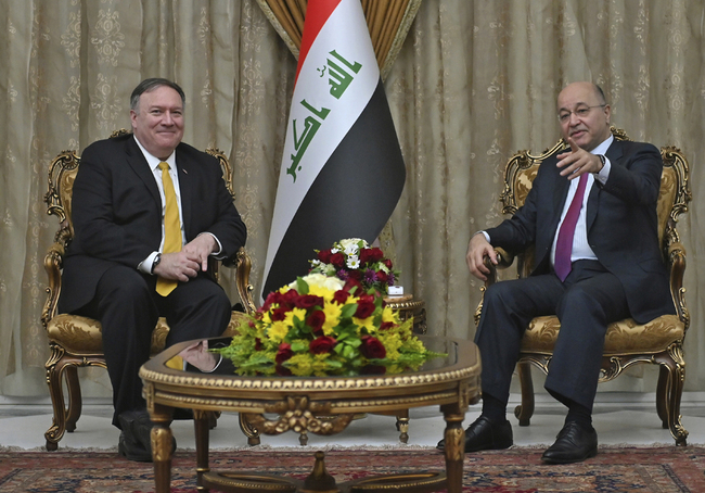 US Secretary of State Mike Pompeo, left, meets with Iraqi President Barham Salih, in Baghdad, Iraq, Wednesday, Jan. 9, 2019. [Photo: Pool via AP/Andrew Caballero-Reynolds]