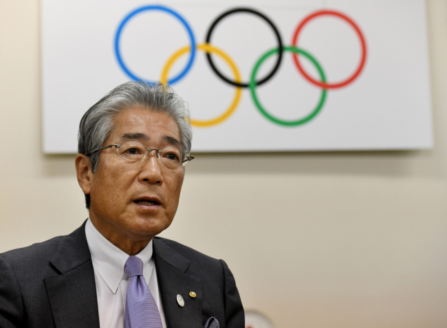 This file photo taken on January 19, 2018 shows Japanese Olympic Committee president Tsunekazu Takeda speaking during an interview with AFP at his office in Tokyo. [File photo: AFP/Toshifumi Kitamura]