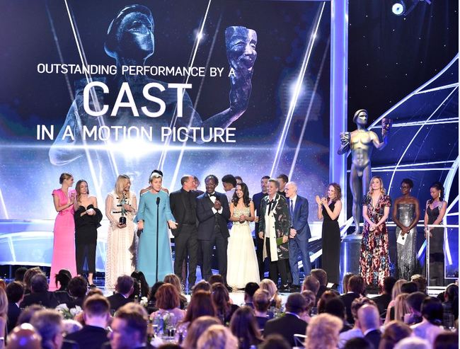 Frances McDormand and the cast of "Three Billboards Outside Ebbing, Missouri" accept the award for outstanding performance by a cast in a motion picture at the 24th annual Screen Actors Guild Awards at the Shrine Auditorium & Expo Hall on Sunday, Jan. 21, 2018, in Los Angeles. [Photo: AP]