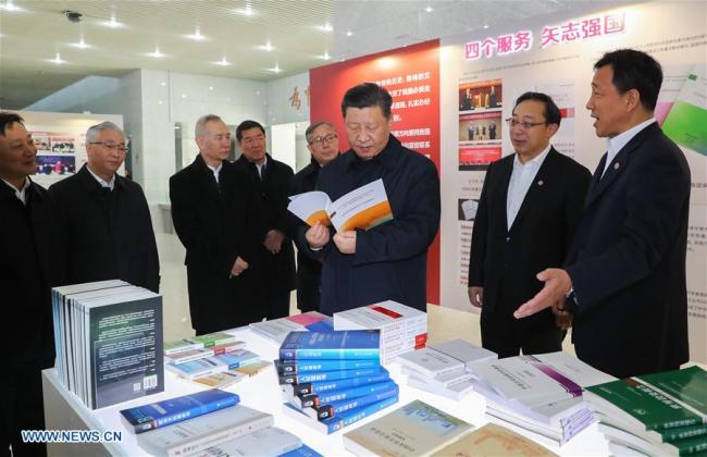Xi Jinping, general secretary of the Central Committee of the Communist Party of China, Chinese president and chairman of the Central Military Commission, visits an exhibition on Nankai University's 100-year history at the university in Tianjin, Jan. 17, 2019. [Photo: Xinhua/Xie Huanchi]