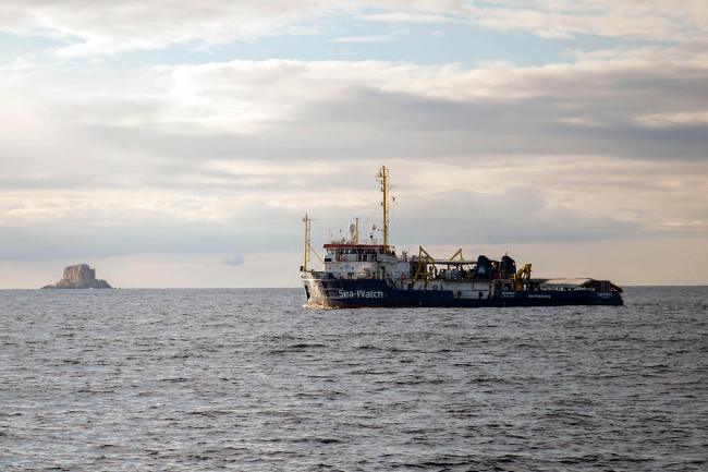 In this Tuesday, Jan. 8, 2018 filer, the Sea-Watch rescue ship waits off the coast of Malta. A migration official says survivors have told rescuers that up to 117 migrants might have died when a rubber dinghy capsized in the Mediterranean Sea off Libya. Flavio Di Giacomo of International Organization for Migration says three survivors were plucked to safety by an Italian navy helicopter Friday, Jan. 18, 2019 and they say 120 were aboard when the dinghy left Libya. [File Photo: AP/Rene Rossignaud]