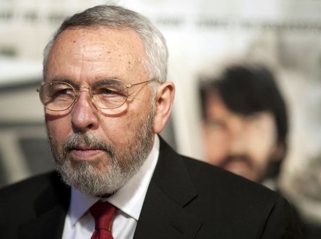 Antonio "Tony" Mendez, former CIA technical operations officer, poses for photographers at the premiere of the film Argo in Washington on Oct. 10, 2012. [Photo: AP Photo/Cliff Owen]