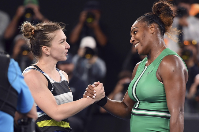 United States' Serena Williams, right, is congratulated by Romania's Simona Halep after winning their fourth round match at the Australian Open tennis championships in Melbourne, Australia, Monday, Jan. 21, 2019. [Photo: AP]