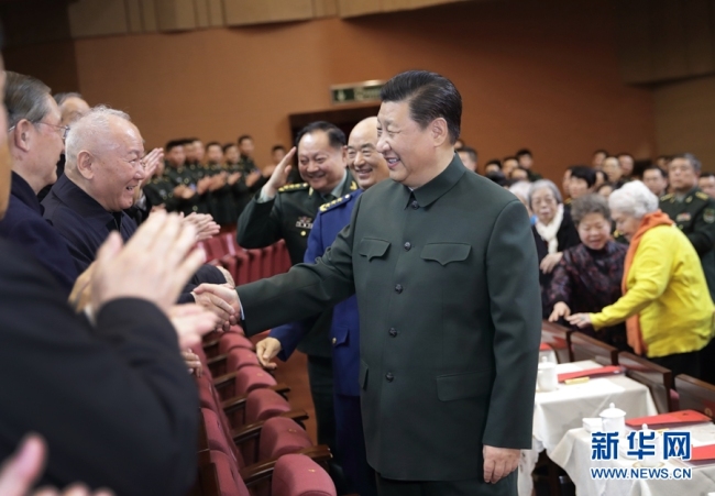 President Xi Jinping extends his Spring Festival greetings to military veterans and retired military officials in Beijing, on January 22, 2019. [Photo: Xinhua] 
