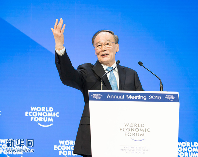 Chinese Vice President Wang Qisan addresses the annual meeting of the World Economic Forum in Davos, Switzerland, Wednesday, Jan. 23, 2019. [Photo: Xinhua]