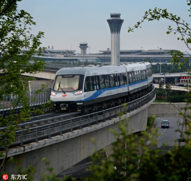 A maglev train runs on China's first medium-low speed maglev railway in May 2016 in Changsha. [File Photo: IC]