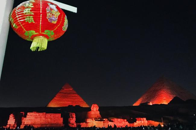 The Pyramids of Giza in Cairo lit up to celebrate the Chinese New Year, on February 2, 2019. [Photo: China Plus/Mi Chunze]