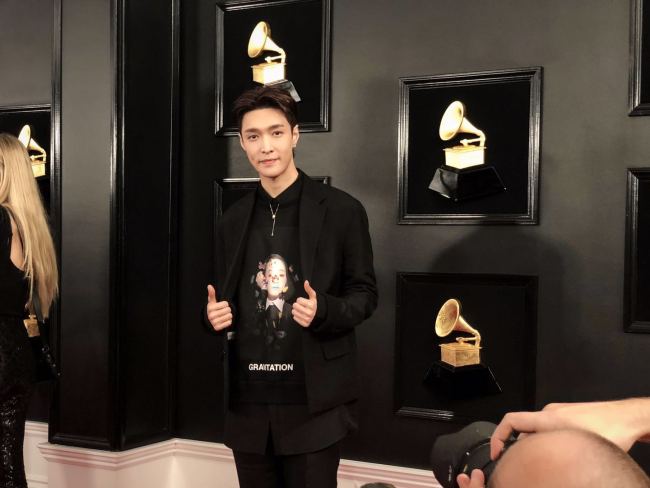 Chinese musician Lay Zhang poses on the red carpet at the 2019 Grammy Awards, Los Angeles, California, February 11, 2019. [Photo provided to China Plus]