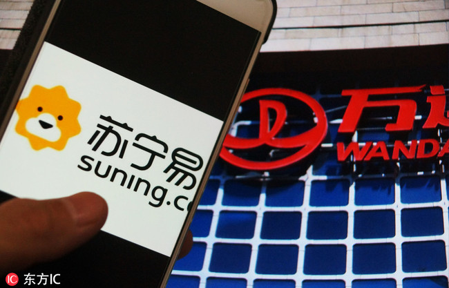 Chinese e-commerce giant Suning.com will acquire all Wanda Department Stores to expand its offline presence and improve their shopping experience.[File Photo: IC]