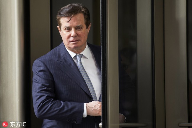 ormer Trump campaign chairman Paul Manafort departs the federal court house after a status hearing in Washington, DC, USA, on 14 February 2018. [Photo: IC]
