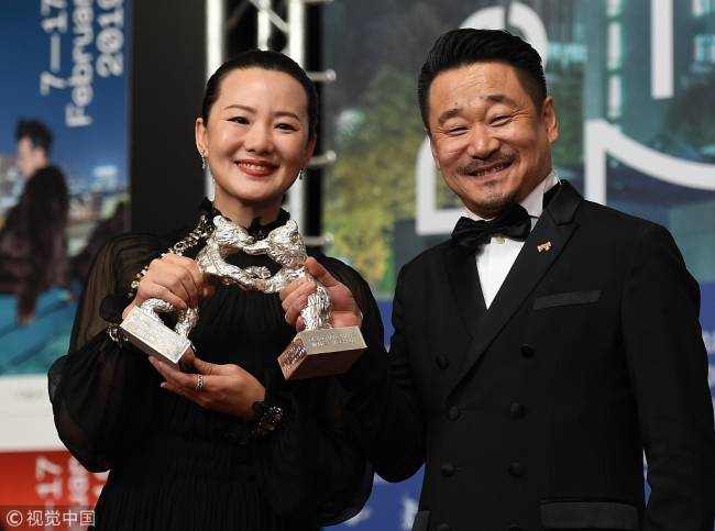 Chinese actor Wang Jingchun and actress Yong Mei win the Silver Bears for Best Actor and Best Actress for their performances in the film "So Long, My Son" at the 69th Berlin International Film Festival (Berlinale) on February 16, 2019. [Photo: VCG]