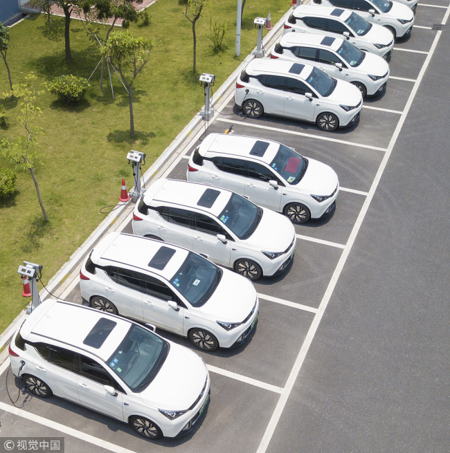 A row of electric vehicles are seen in Guangzhou, Guangdong Province, July 11, 2018. [Photo: VCG]