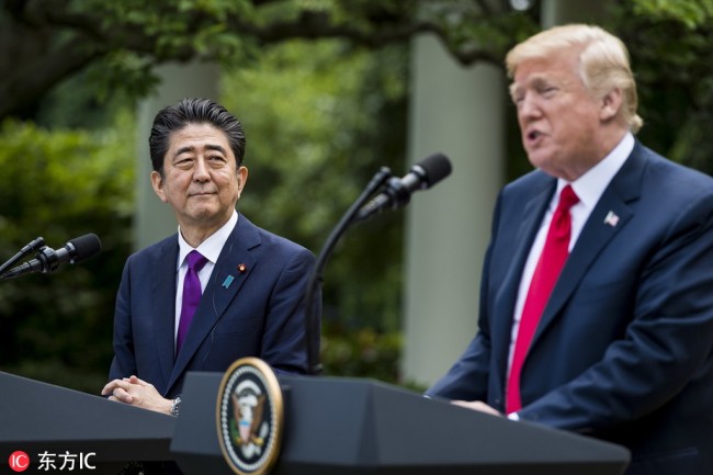 US President Donald J. Trump (R) and Japanese Prime Minister Shinzo Abe (L) participate in a joint press conference in the Rose Garden of the White House in Washington, DC, June 7, 2018. [File photo: EPA via IC/Pete Marovich]