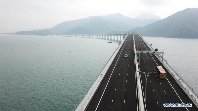 Aerial photo taken on Oct. 24, 2018 shows cars running on the Hong Kong-Zhuhai-Macao Bridge. [File photo: Xinhua]