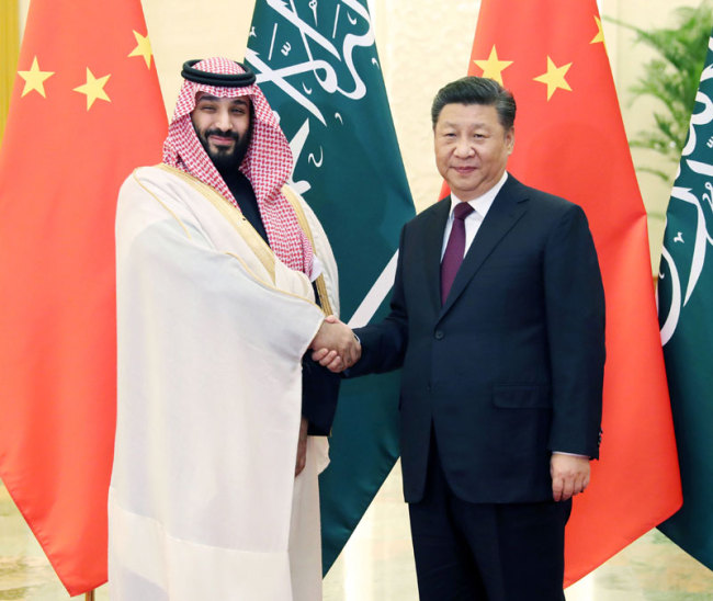 Chinese President Xi Jinping (R) meets with Mohammed bin Salman Al Saud, Saudi Arabia's crown prince, at the Great Hall of the People in Beijing on Friday, February 22, 2019. [Photo: Xinhua]