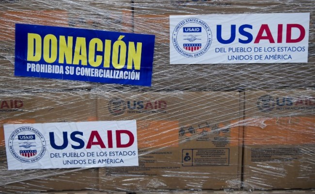 Humanitarian aid is seen in Cucuta, Colombia, on February 21, 2019, at the Tienditas International Bridge which has been blocked with containers by Venezuelan authorities to prevent access to the country. [Photo: AFP]
