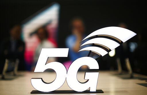 A banner of the 5G network is displayed during the Mobile World Congress wireless show, in Barcelona, Spain, Monday, Feb. 25, 2019. [Photo: AP]