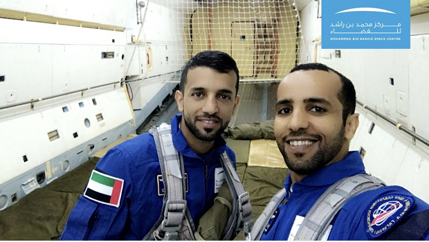 Emirati astronauts Sultan al-Neyadi, left, and Hazza al-Mansoori, take a selfie in the International Space Station. [Screenshot: China Central Television]