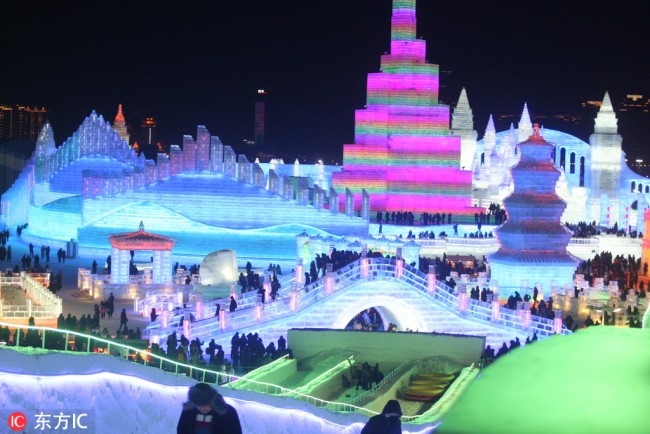 A night view of illuminated ice sculptures on display during the 35th Harbin International Ice and Snow Festival in Harbin city, northeast China's Heilongjiang province, 5 January 2019. [Photo: IC]