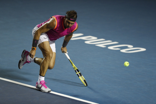 Spain's Rafael Nadal chases a ball in his Mexican Tennis Open round 2 match against Australia's Nick Kyrgios, in Acapulco, Mexico, Wednesday, Feb. 27, 2019. [Photo: AP]