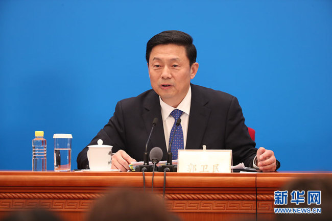 Guo Weimin, spokesperson for the second session of the 13th National Committee of Chinese People's Political Consultative Conference (CPPCC), speaks during a press conference at the Great Hall of the People in Beijing, on Saturday, March 2, 2019. [Photo: Xinhua]