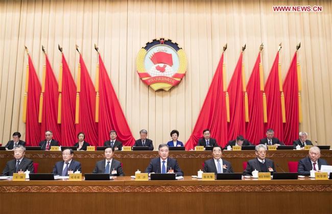 Wang Yang (C, front), chairman of the Chinese People's Political Consultative Conference (CPPCC) National Committee, presides over the closing meeting of the fifth session of the Standing Committee of the 13th CPPCC National Committee in Beijing, capital of China, March 1, 2019. [Photo: Xinhua/Huang Jingwen]