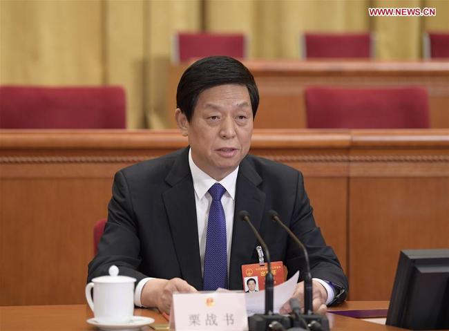 Li Zhanshu, chairman of the National People's Congress (NPC) Standing Committee, presides over a preparatory meeting for the second session of the 13th NPC at the Great Hall of the People in Beijing, capital of China, March 4, 2019. [Photo: Xinhua/Li Xueren]