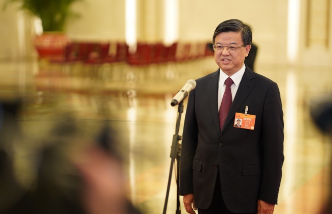 Ni Yuefeng, the head of the General Administration of Customs, interviewed by the media at the Great Hall of the People in Beijing on Tuesday, March 5, 2019. [Photo:Xinhua]