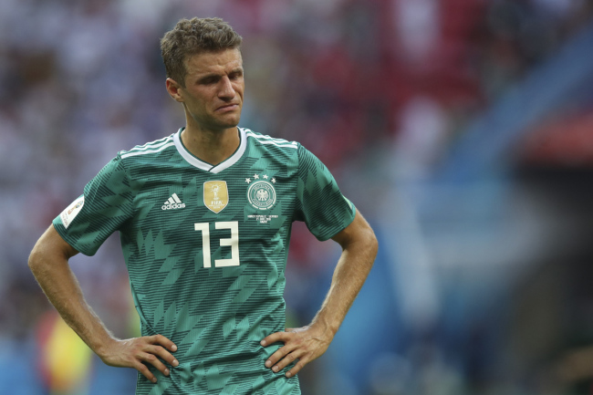 Germany's Thomas Mueller leaves the pith at the end of the group F match between South Korea and Germany, at the 2018 soccer World Cup in the Kazan Arena in Kazan, Russia, Wednesday, June 27, 2018. South Korea won 2-0. [File photo: AP]