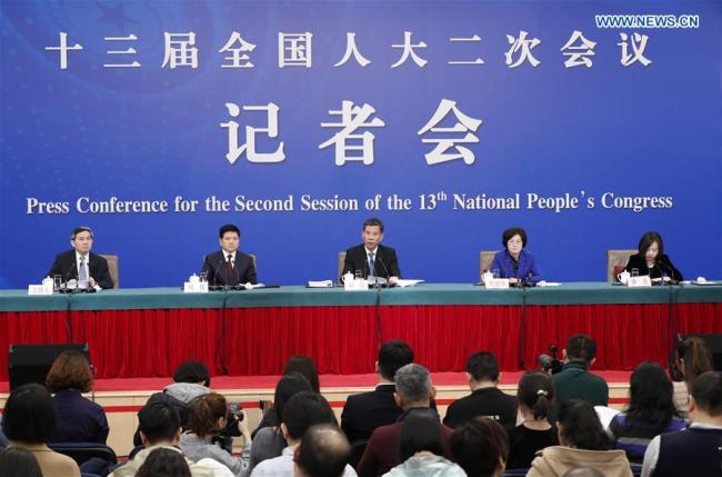 China's Minister of Finance Liu Kun (C), and vice ministers Cheng Lihua (2nd R) and Liu Wei (2nd L) attend a press conference on the country's fiscal and tax reforms and fiscal work for the second session of the 13th National People's Congress in Beijing, capital of China, March 7, 2019. [Photo: Xinhua]
