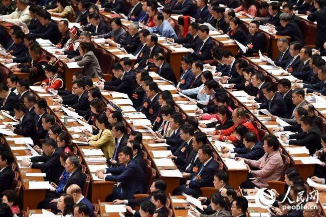 The second plenary meeting of the second session of the 13th National People's Congress (NPC) opens at the Great Hall of the People in Beijing on Friday, March 8, 2019. [Photo: people.cn]