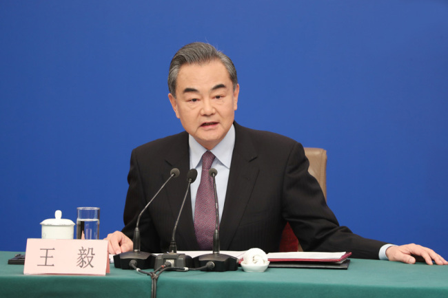 Chinese Foreign Minister Wang Yi meets the press in Beijing on Friday, March 8, 2019. [Photo: Xinhua]