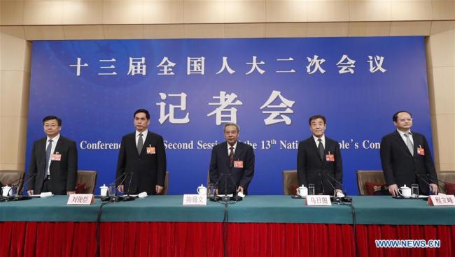 Chen Xiwen (C), chairman of Agriculture and Rural Affairs Committee of the National People's Congress (NPC), Uzhitu (2nd R), vice chairman of Financial and Economic Affairs Committee of the NPC, Liu Junchen (2nd L) and Xu Anbiao (1st L), both vice chairman of Legislative Affairs Commission of the NPC Standing Committee, and Cheng Lifeng, member of the Natural Resource and Environmental Protection Committee of the NPC, attend a press conference on the legislative work of the NPC for the second session of the 13th NPC in Beijing, capital of China, March 9, 2019.[Photo:Xinhua]